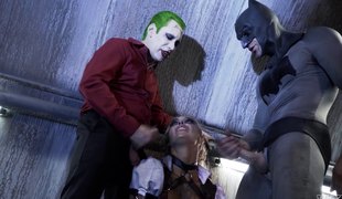 Joker and Batman team up and surround Harley Quinn with their cocks!